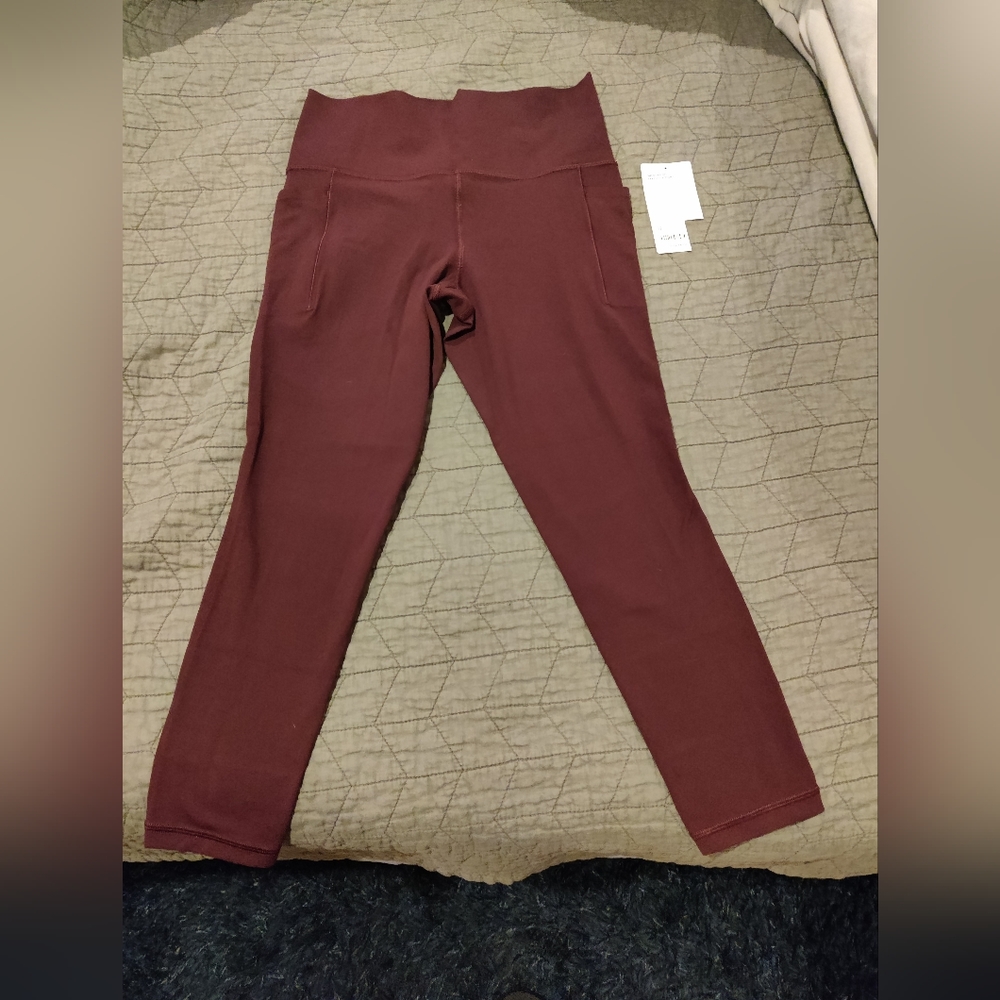 Athleta Salutation Stash 7/8 Tights